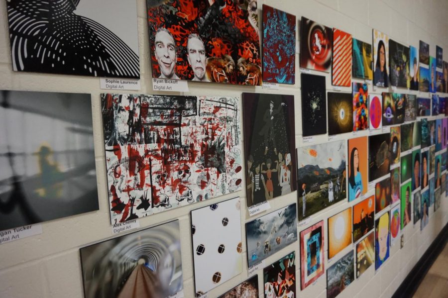 Student artwork from various subjects is displayed.