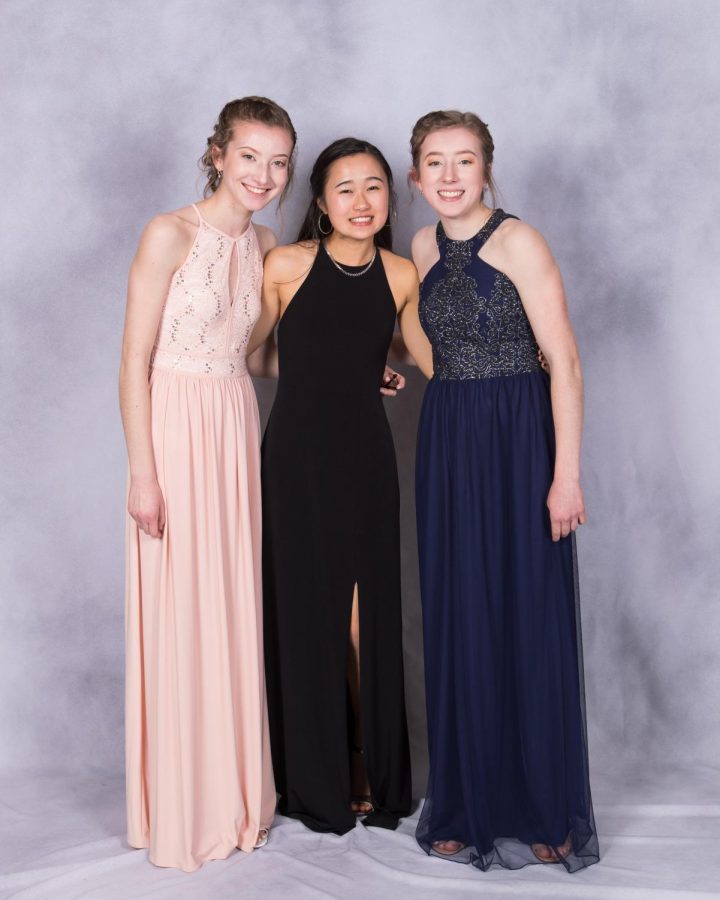 Seniors Jody Sunray, Liliko Uchida and Molly Sunray at prom last May. Uchidas dress cost her around $100.