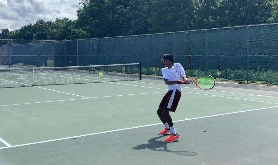Sophomore and third singles player Bharathan Sundar prepares to hit a backhand in the state finals match.