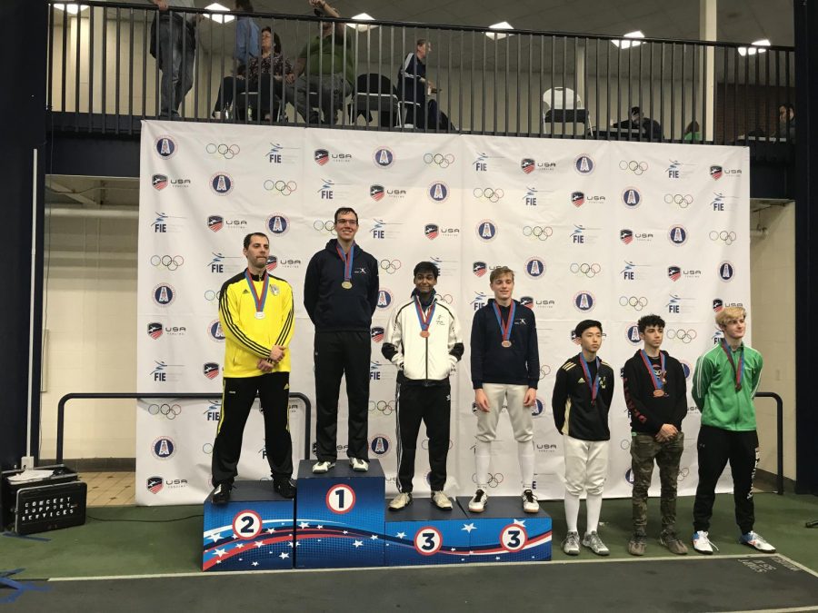 Senior Arthur Andreev [fourth from left] at the American Challenge in Madison, New Jersey on Oct. 6 2019.  Andreev tied for third in the Div 1-A Mens Épée event. 