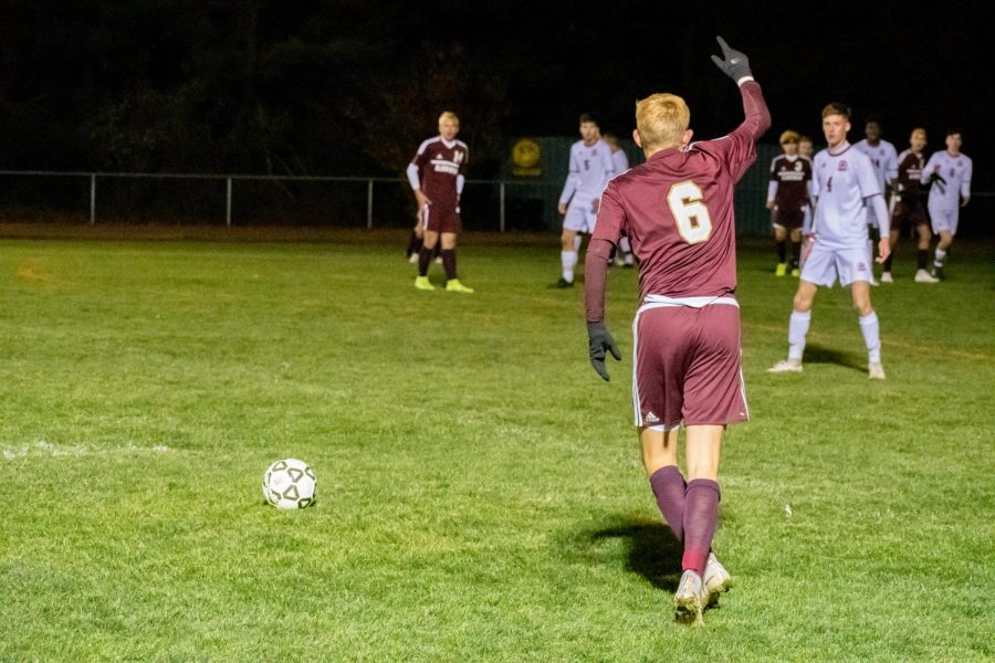 Junior Carsten Boloz kicks the ball into play against Westborough in the CMass Quater Finals. The team lost to Westborough 2-1 in double overtime.