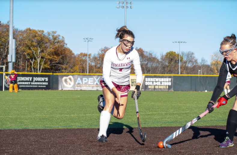 A Marlborough defender attempts to stop senior Alex Moll from advancing the ball downfield. Algonquin defeated Marlborough 3-1 in their first playoff game and Moll scored one goal. The other goals were scored by freshman Grace Ammon and junior Day Ruffo.