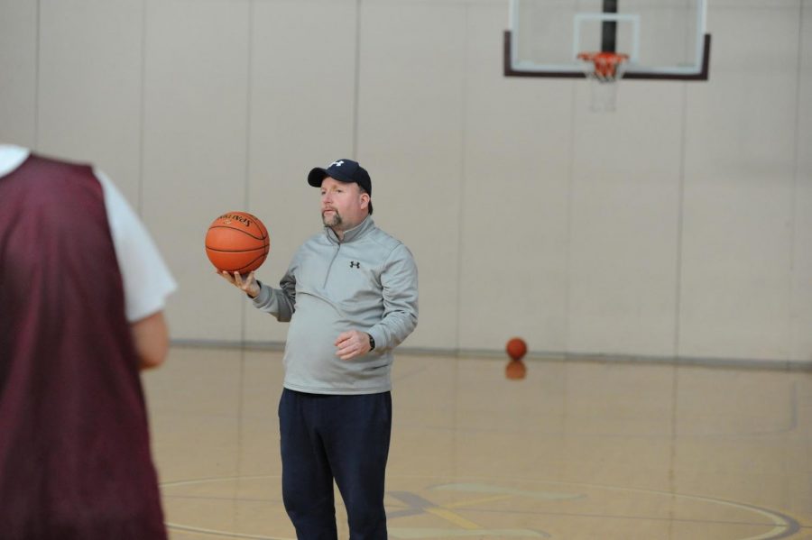 Basketball coach Brain Doherty at a basketball practice in the 2019 winter season. At the end of that season, he was named the Division 1 CMASS basketball coach of the year.