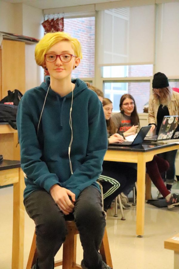 "I'm trying to bring out what the original presidents gave to me and trying to be that rock and foundation," junior and GSA president Maxwell Vere, who sits during a GSA meeting, said.