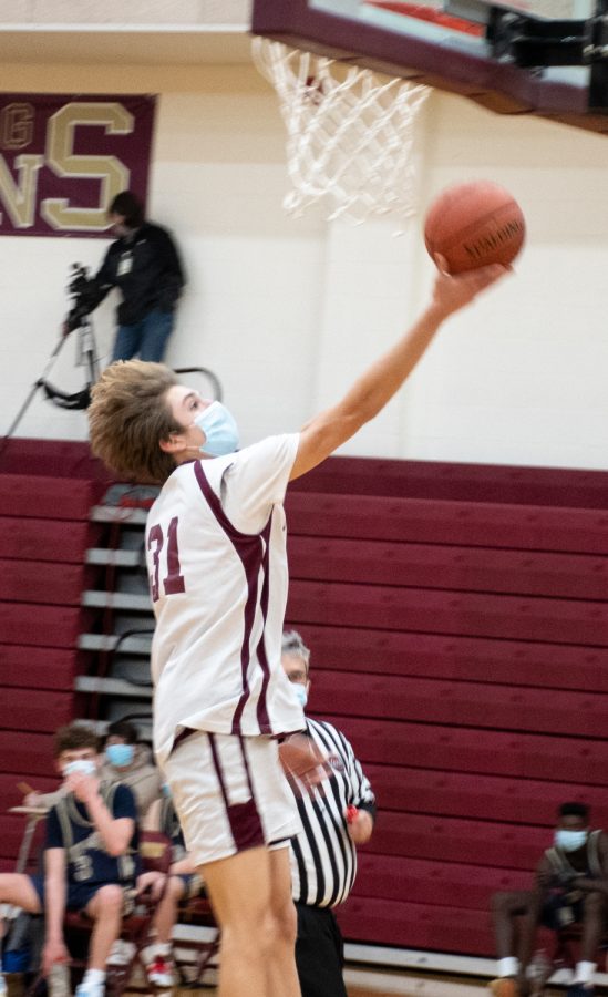 Freshman Andrew Eiben attempts a layup during the JV2 basketball game against Shrewsbury on January 22.