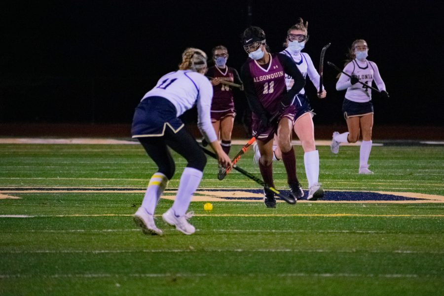 Senior Day Ruffo advances the ball to the net. The varsity field hockey team went on to beat Shrewsbury 1-0 and take the Pod 8 championship during this game. 