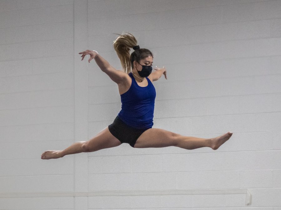 Senior captain Acacia Truong practices her beam skills during tryouts on December 16.
