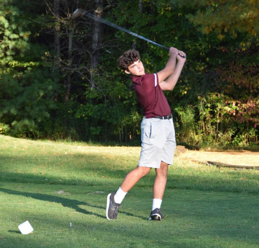 Freshman Luke Palma follows through on his shot off the tee. After a hard fought game, Algonquin lost against Wachusett 168-160.