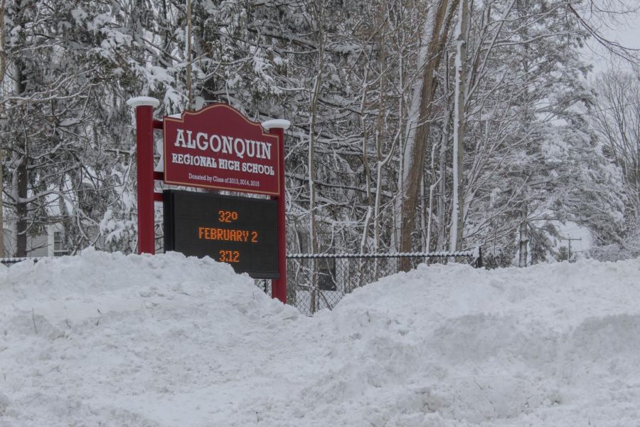 Snow banks nearly covered the schools sign on Bartlett Street on Tuesday, Feb. 2, the recent official snow day during which there was no remote learning. 