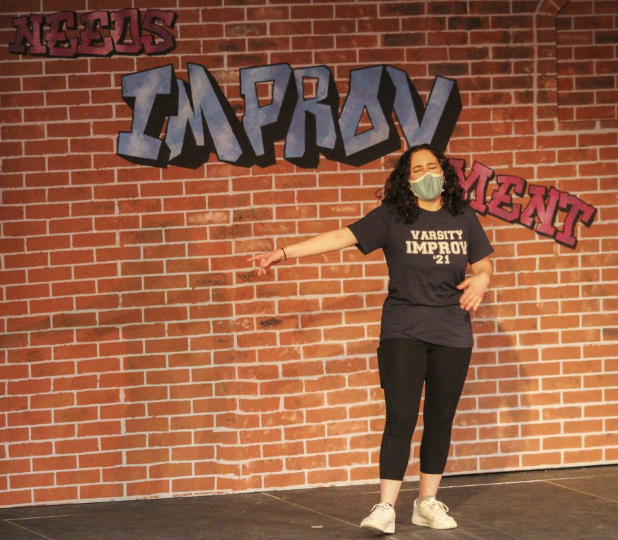During the improv show, students had the chance to show off some amazing vocal skills. Junior Mari Fellenbaum sings during the musical improv portion of the show. 