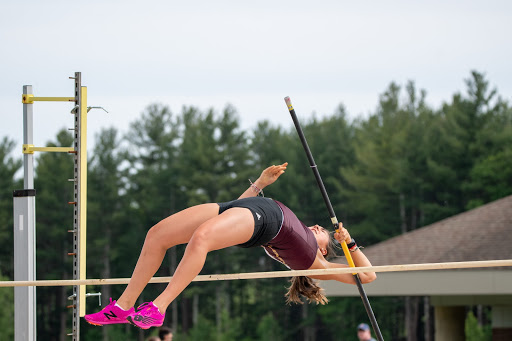 Junior Jolina Dantz pole vaults at the track meet on May 25. 