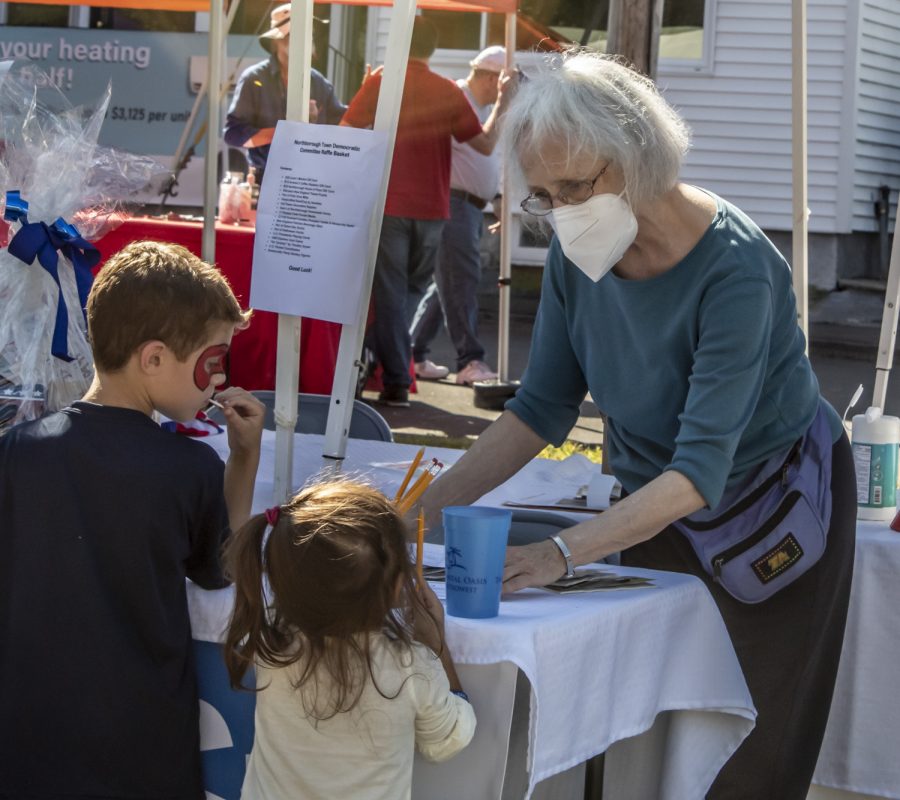 Community members interacted at various booths and tents at the Applefest Street Fair.