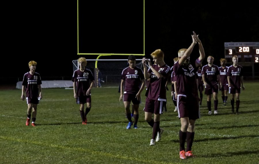 The boys varsity soccer team celebrates winning the first-round CMADA Division 1 game against Worcester South 3-0.