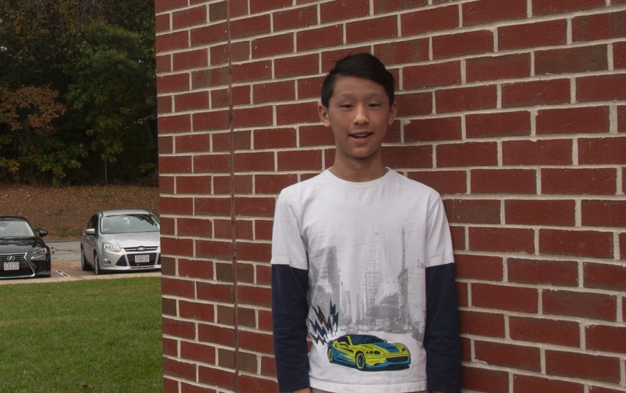 Timothy Zhang poses outside during lunch on Friday, Oct. 29.