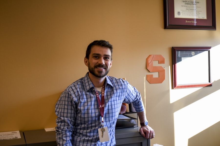 The new guidance counselor Rob Provenzano shows off his Syracuse pride in his office on Tuesday, Nov. 30, 2021.