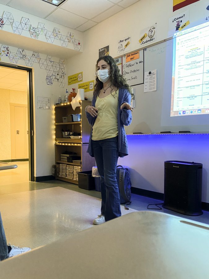 Global Goals club leader Alison Hojlo directs the clubs second meeting of the year on Thursday, Dec. 2, 2021.