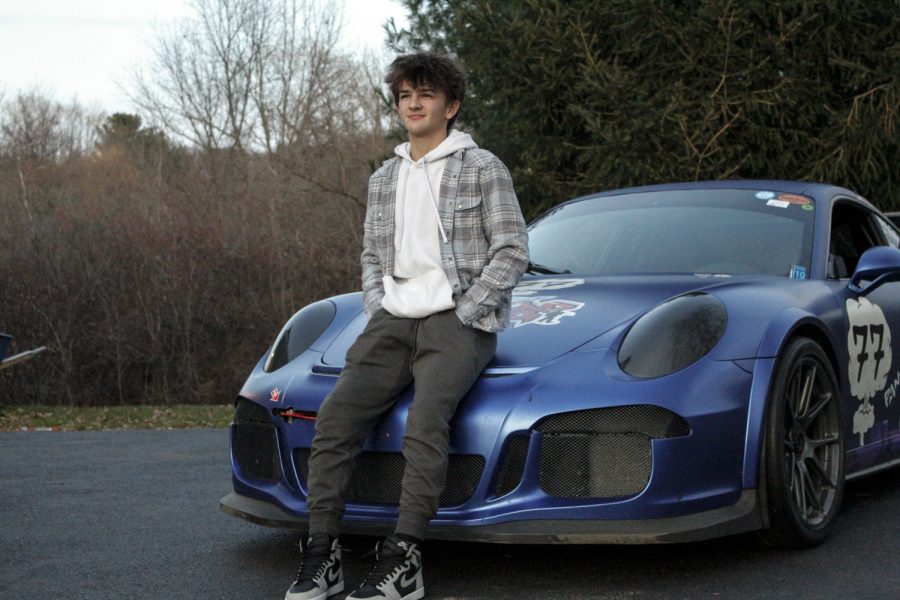 Sophmore Ryan Ledoux with his familys Porshe 911 GT3 that he races for charity Dec. 5 2021.
