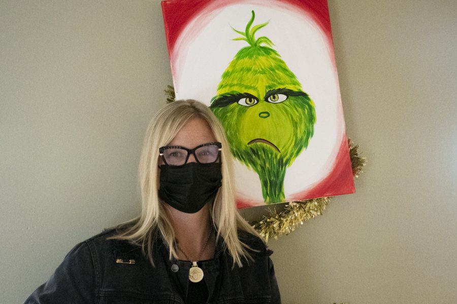 Applied Arts and Technology teacher Nicole Ruffo and the infamous Grinch side by side. 