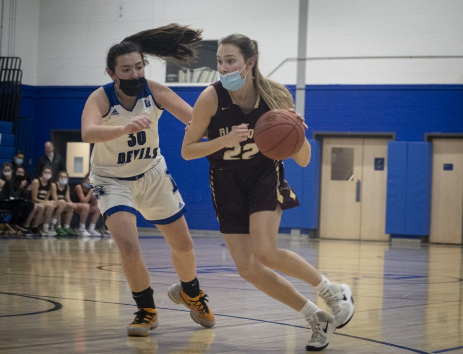 Senior Anna Grace Hjerpe drives to the basket in a close game against Leominster on Jan. 13, 2022.