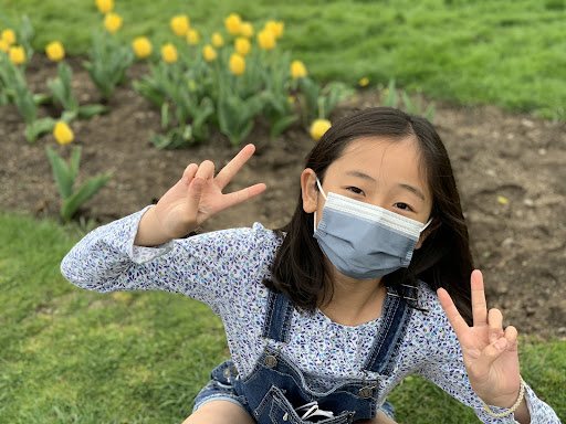 My then 10-year-old sister poses for a photo when my family and I walked around Boston Common in the spring of 2021. It was crowded with many others milling around and enjoying the return of warm weather. We were all making the best of our time in the pandemic.
