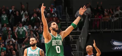 Celtics forward Jayson Tatum celebrates in a road game against the Charlotte Hornets at Spectrum Center on March 9, 2022.