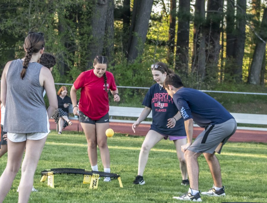 A group of students play spike ball while waiting to walk for Relay for Life. 