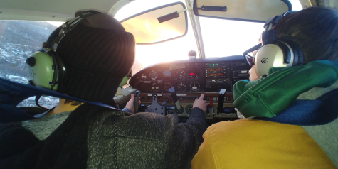 Freshman Greg Alberti completes an unassisted landing at Fitchburg Airport with his flight instructor.