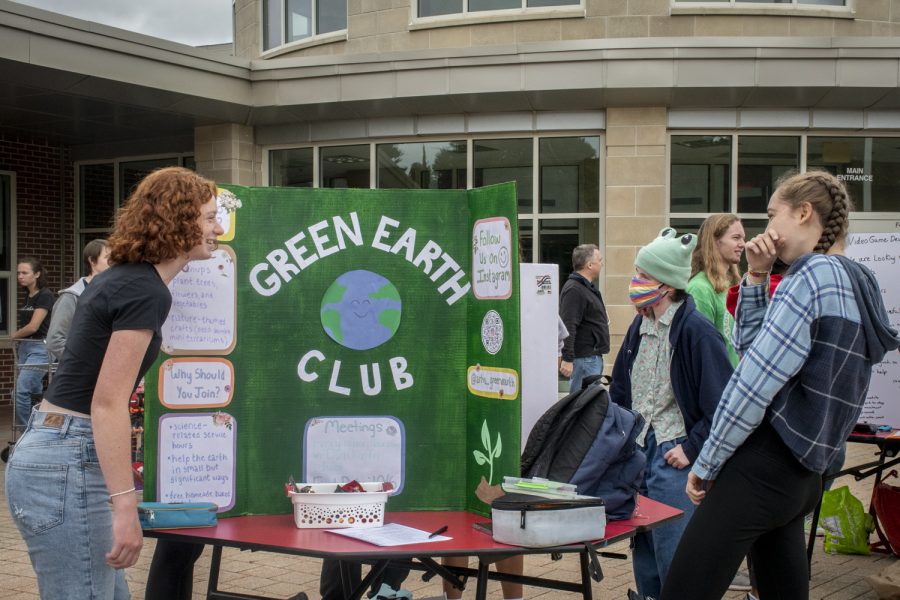 Members of the Green Earth Club have a conversation during the Activities Extravaganza on Wednesday, September 21.