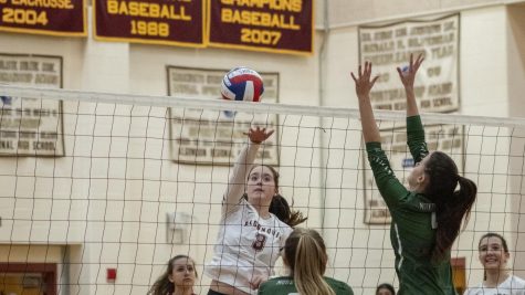 Sophomore Ella Poultney hits the ball during the Girls Volleyball CMASS finals against Wachusett on Oct. 29. Algonquin won the game 3-0.