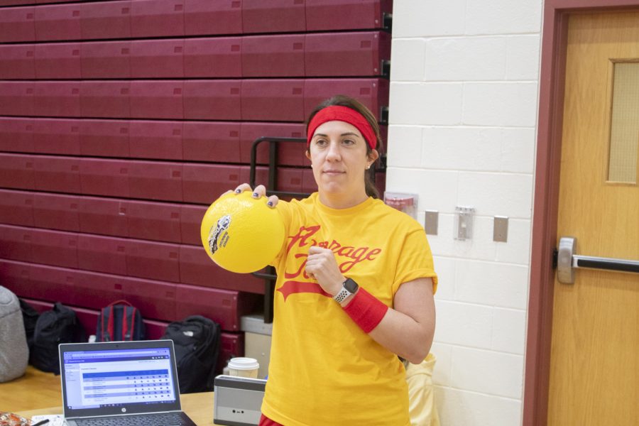 Health and Fitness teacher Kristen Morcone shows off her dodgeball costume, during halloween spirit day on Monday, Oct. 31, 2022.