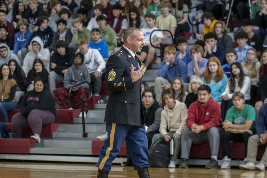 Army Command Sergeant Major Anthony Pittman talks about his military experience at the Veterans Day Assembly, which was hosted by Operation Enduring Freedom.