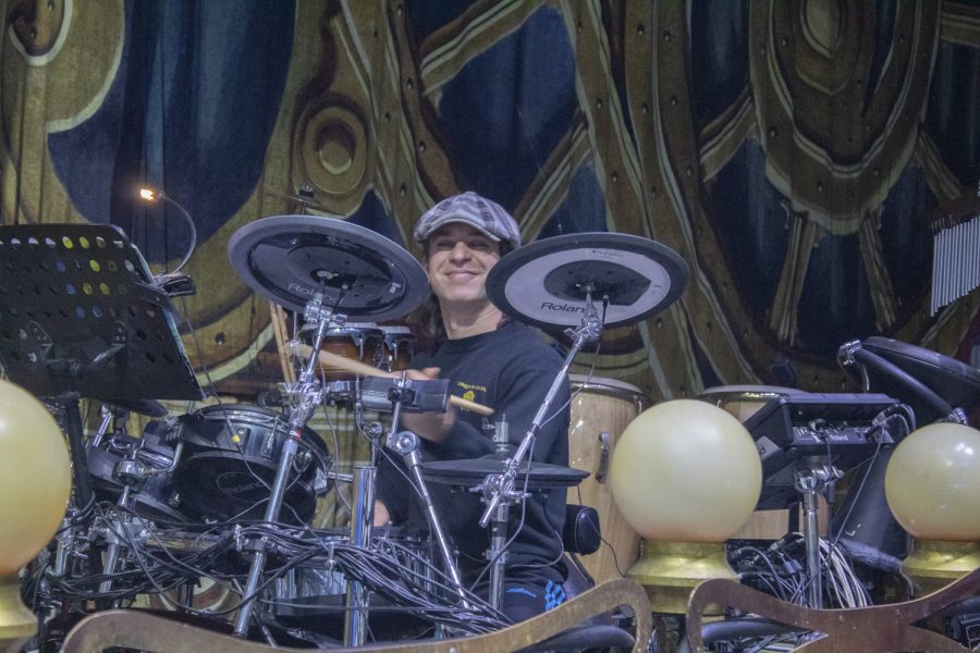 Drummer Alexandre Reis Rodrigues Soares warms up on the drums for the Cirque du Soleil performance. The musician is from Brazil, one of more than 28 nationalities in the cast. 