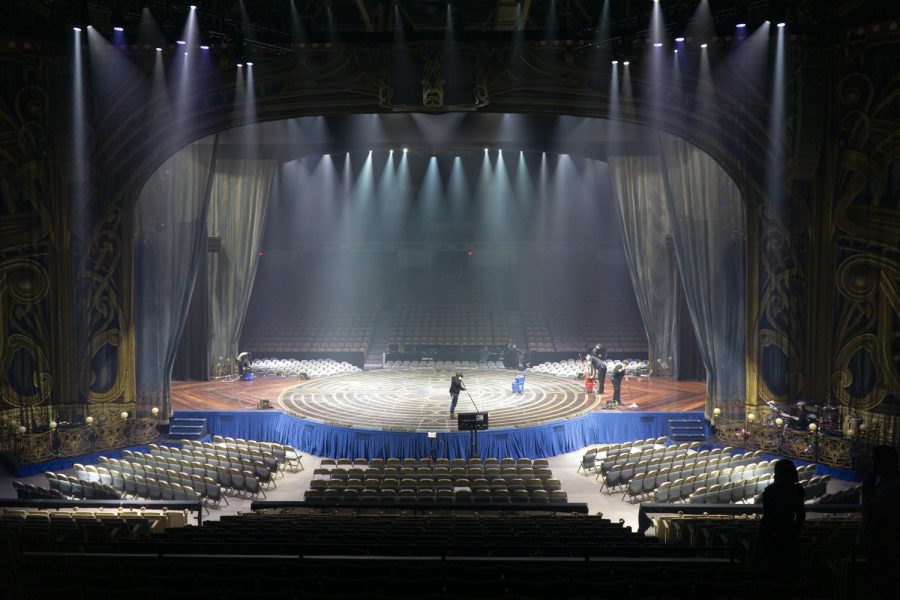 DCU staff members clean up the stage after the performers finish practicing their skills before Cirque du Soleil’s touring show, Corteo, on Jan. 12.