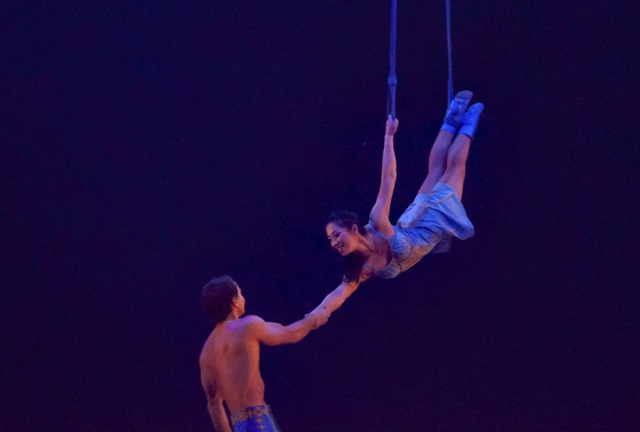 Two performers interact with each other on stage during Corteo  at the DCU Center on Jan. 12, 2023.