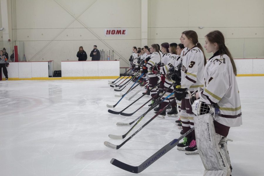 The girls hockey team competes in the MIAA playoff Round of 16 tournament against Dedham High School on March 6. The final score was 4-3.
