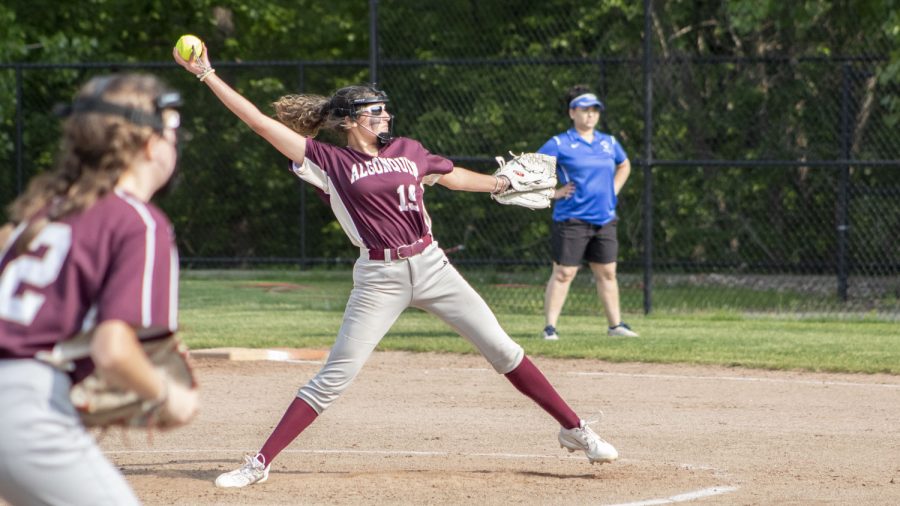 Freshman pitcher Emily Ruiz winds up to pitch the ball during the softball game on May 23. Algonquin beat Murdock 13-0.