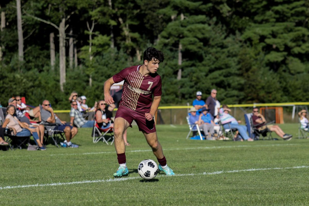 Junior Zach Ruthfield looks for a pass at the boys soccer game against Leominster on Sept. 14.