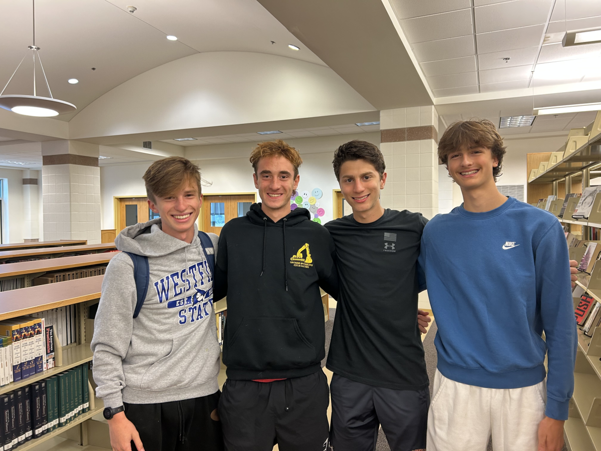 Junior Jonah Gould and senior captains Jonathan Meschisen, Aiden Ruiz and Christopher Kardos have helped lead the boys cross country team to success this season.