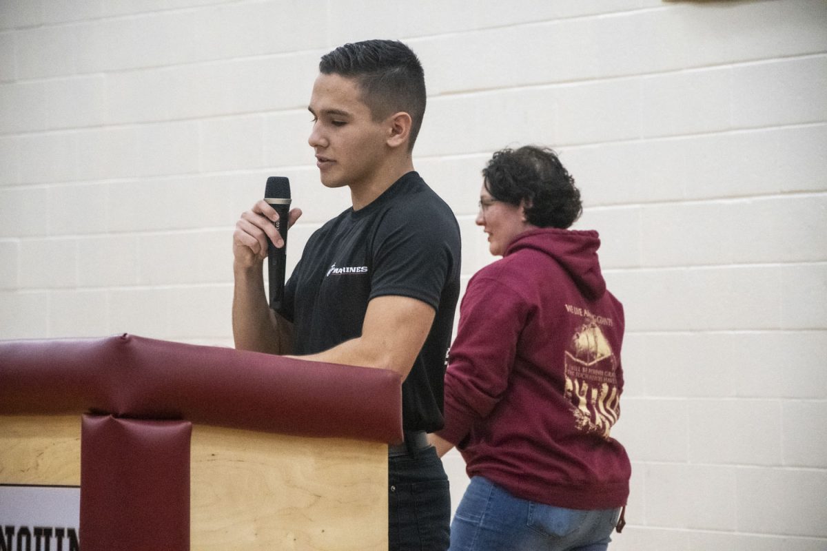 Senior and Marine Corps Poolee Adam Franca gave opening remarks and  detailed introductions of the guest speakers to the students and faculty attending the Veterans Day assembly on Monday, November 13.