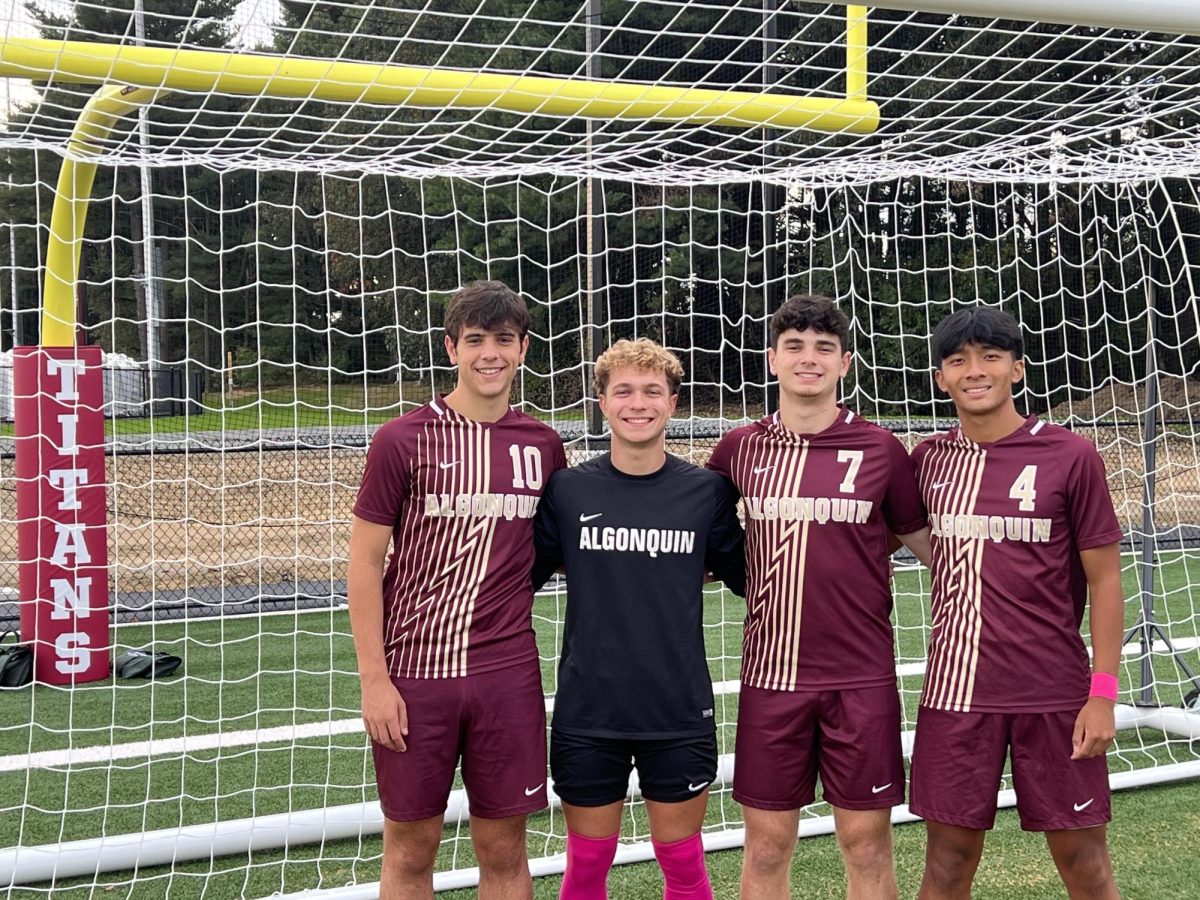 Senior captains Garrett Burns, Owen Provencal and Keenan Siao, along with junior Zach Ruthfield, led the boys soccer team this fall season.