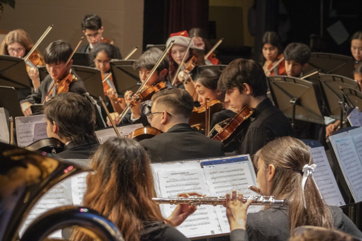 Orchestra students perform during the Holiday Concert on Dec. 19, 2023.