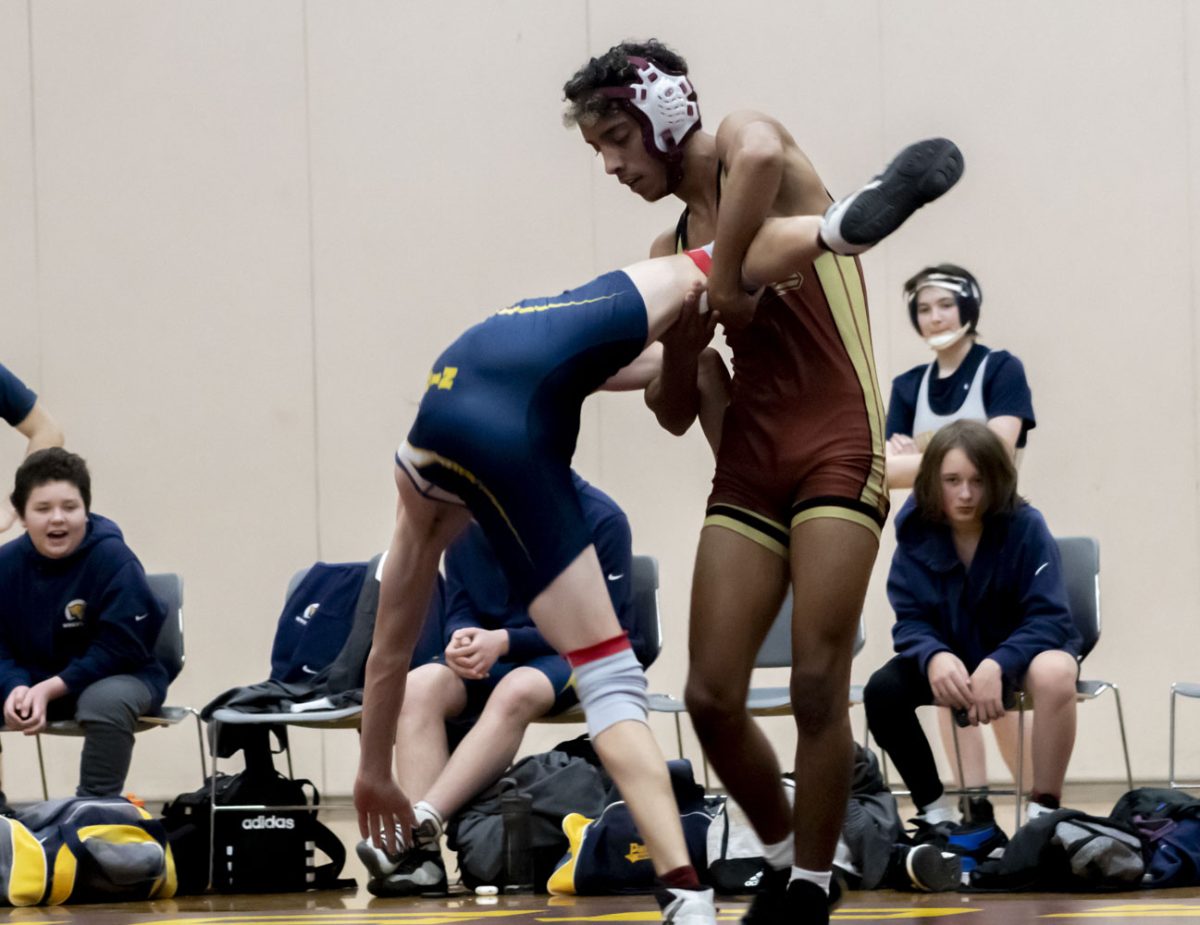 Junior+Hendrill+Costa+throws+his+opponent+onto+the+floor+during+the+Wrestling+meet+against+Quabbin+at+Algonquin+on+Wednesday%2C+Jan.+10%2C+2024.