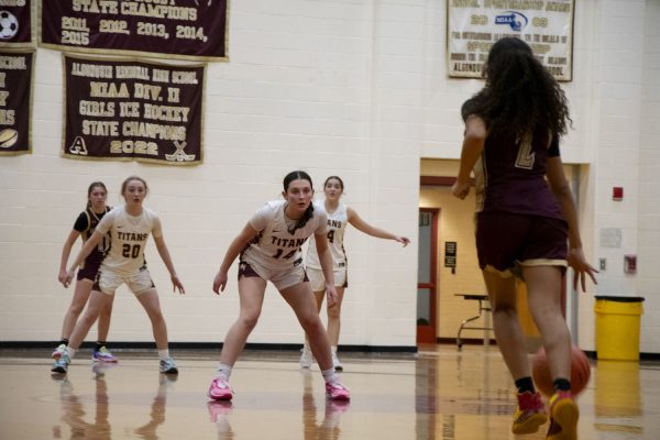 Sophomore Niki Chacharone plays defense at the girls basketball game against Shepherd Hill on Dec. 8, 2023. Algonquin won 52-45. 