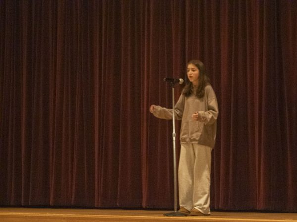 Freshman Emma Jones wins first place at the Poetry Out Loud finals for her performances of Song by Brenda Cárdenas and Where the Wild Things Go by D. Gilson.