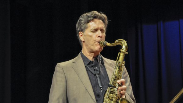 Tenor saxophonist Ed Harlow plays with student musicians during Jazz Night on Feb. 28.