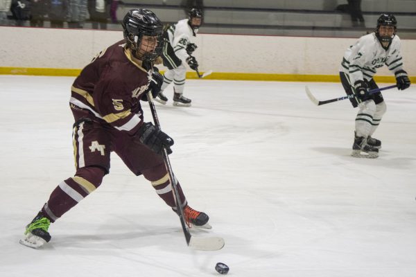 Algonquin sophomore Brenna Joyce takes possession of the puck during the Final Four playoff game on March 9, 2024.