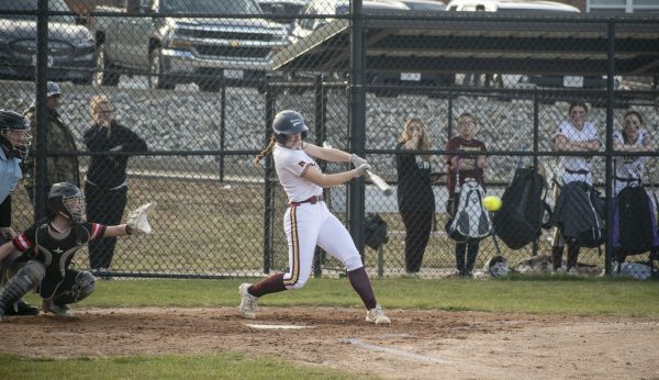 Up at bat, junior Phoebe Lefevbre hits the ball during the softball game on Monday, April 8, 2024. Algonquin beat Gardner 5-2 in their home opener.
