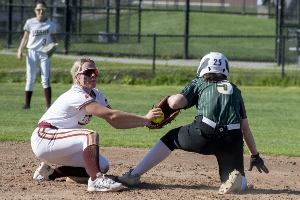 Senior Tessa James hits a Notre Dame offensive player during their game against Notre Dame Academy on May 7. Algonquin loses 18-14 to Notre Dame.
