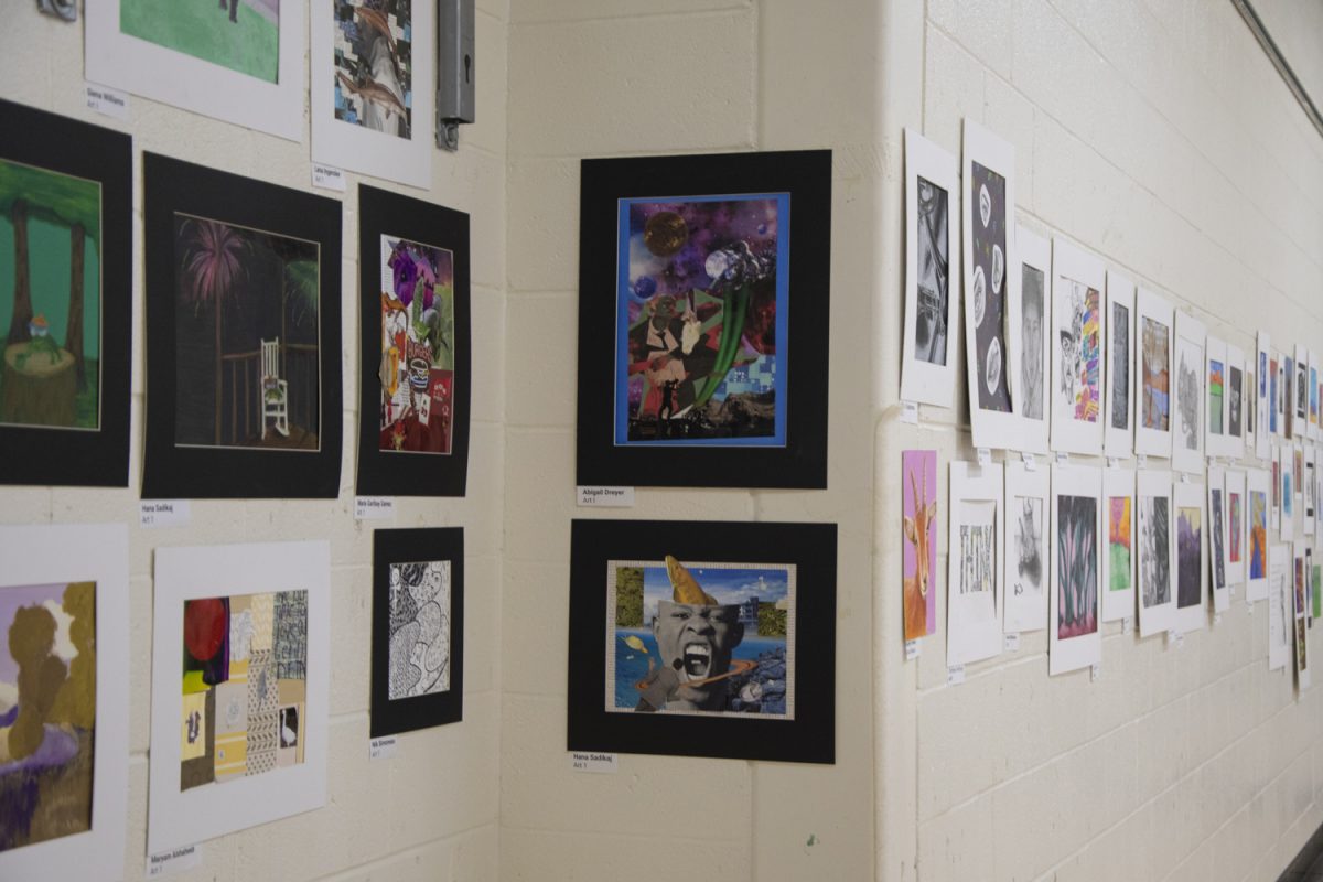 Art 1 students spotlight their art during the Art Show on May 16. The Art Show showcases artists from the 2023-2024 year at Algonquin, incorporating work from students in Photo 1 and 2, Photojournalism, AP Art, Ceramics 1 and 2, and more.