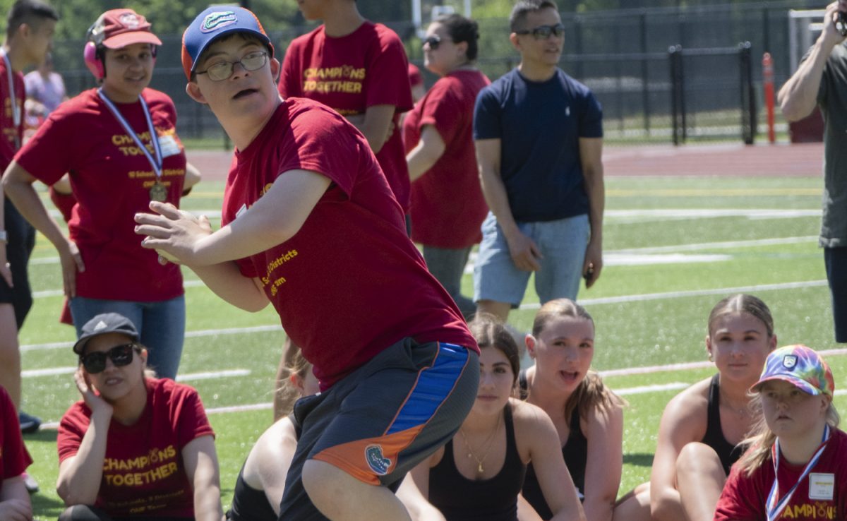 At the Titan Games on May 22, junior Liam Fitzgerald gets ready to throw the ball at the ball toss.